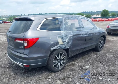 2019 Honda Pilot Touring z USA, uszkodzony, nr VIN 5FNYF6H61KB067739